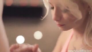 A blonde is having fun with a stud in the studio