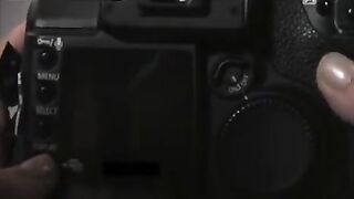 A model is being raped during a photo shoot, showcasing the intense and raw energy of StrapOn’s content