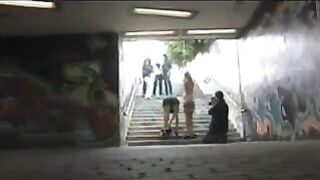 A girl was undressed on the street and had rough sex with a man