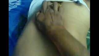 Husband massaged her boobs and nipples, making her wet with pleasure