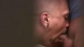 Two guys jerking each other in the public toilet