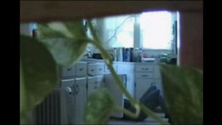 A married couple has fun naked in their apartment, exploring every room