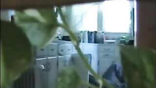 A married couple has fun naked in their apartment, exploring every room
