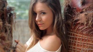 A beautiful Russian girl named Katerina is slowly undressing and showing her body