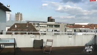 A chick with big tits has sex on the roof in POV