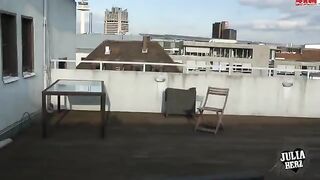 A chick with big tits has sex on the roof in POV