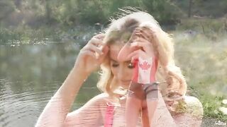 A tender moment of self-pleasure by the lake with a blonde beauty