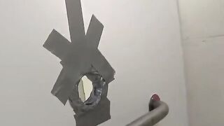 The man checked the holes in the club toilet and had sex