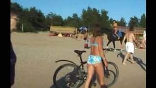 Nudists have sex directly on the beach