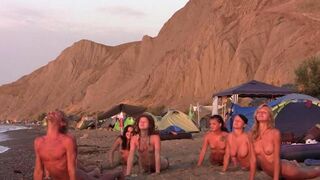 A hot nudist girl is having fun on the naked beach