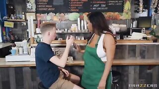 Girl with big boobs works as a barista in the coffee shop