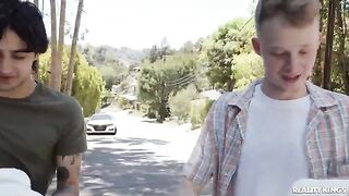 A hot MILF is getting fucked by two young guys in a steamy scene