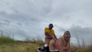 A daring couple engaged in risky public sex on a mountain