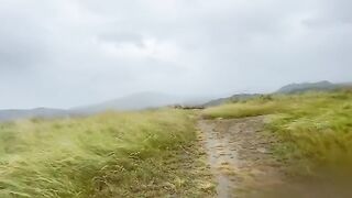 A daring couple engaged in risky public sex on a mountain