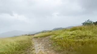 A daring couple engaged in risky public sex on a mountain