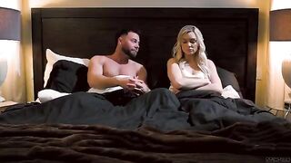 Two passionate blondes are having sex on the bed