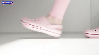 A beautiful girl was fucked in a suit that showed her holes