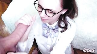 A hot Russian chick with glasses gets her face covered with cum in this steamy video