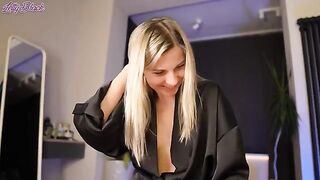 What a stepmom can hide under a robe to surprise her stepson?