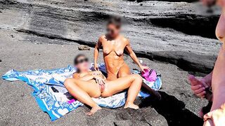 A girl removes her swimming suit and rubs herself while jerking you off