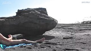 A girl removes her swimming suit and rubs herself while jerking you off