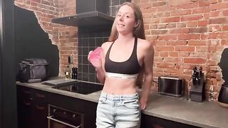 A beautiful woman deserves to be caressed and given kisses in the kitchen