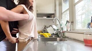The sexy brunette MILF fucked in the kitchen by her husband