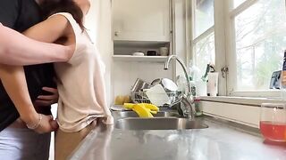 The sexy brunette MILF fucked in the kitchen by her husband