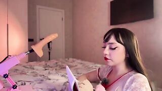 A hot Russian girl plays with a rubber dildo and reaches intense heights